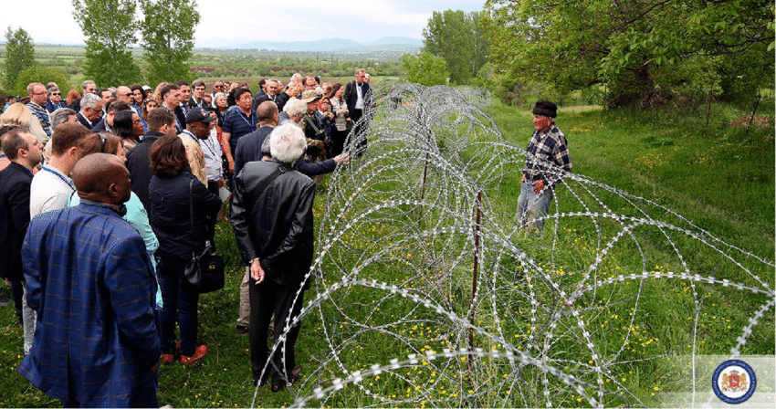 Diplomats visit Data Vanishvili in his divided property in Khurvaleti in May 2015 as part российская оккупация российская оккупация