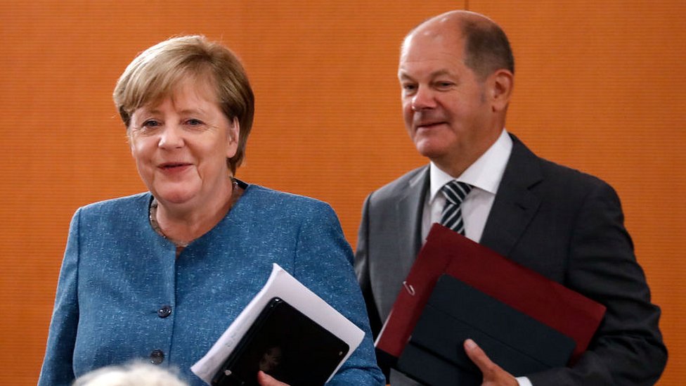 120711193 scholz merkel getty Новости BBC Олаф Шольц