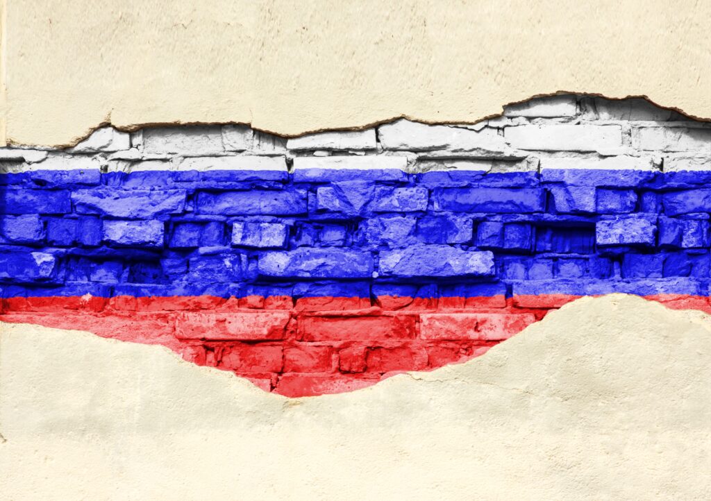 russian flag on brick wall 2021 09 04 11 31 45 utc новости IDFI, Грузия-Россия, Компания