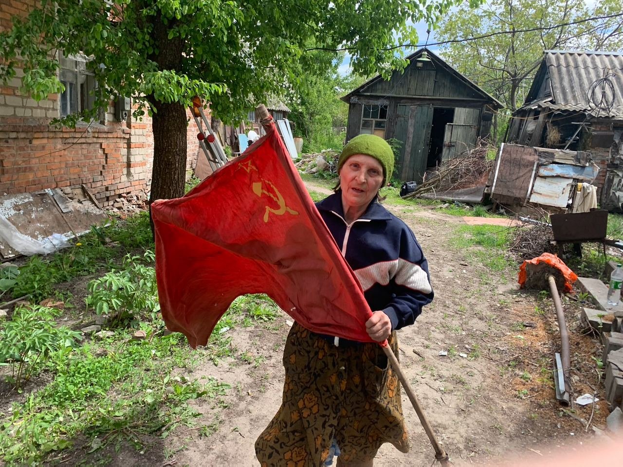 grandmother with red flag