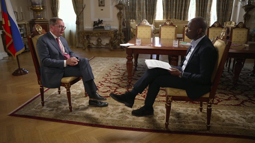 Andrei Kelin and Clive Myrie sitting down during the interview