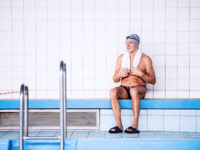 senior man sitting by the indoor swimming pool 2021 08 26 12 07 50 utc новости новости