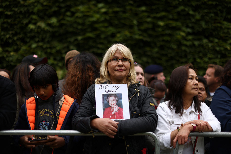 People gather on the day of the state funeral and burial of Britain's Queen Elizabeth, in London, Britain, on 19 September 2022