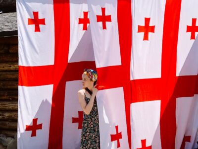 summer a girl near three huge georgian flags 2022 11 15 23 30 03 utc общество featured