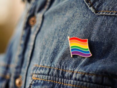 close up of lgbt pin in the form of a flag is pinn 2023 11 27 05 21 09 utc лгбт-пропаганда лгбт-пропаганда