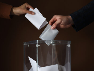 transparent box and hands with voting papers on br 2023 12 22 22 56 05 utc Россия Россия