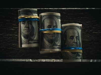 close up of dollar banknotes in rolls with rubber 2024 11 19 09 02 06 utc новости featured, Грузинская мечта, Ираклий Гарибашвили, Ираклий Кобахидзе, коррупция