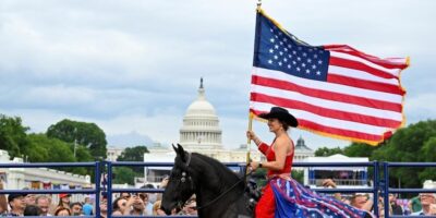 A performer rides a horse during a rodeo at The Great American State Fair on the National Mall