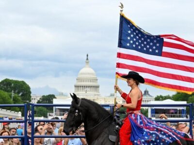 A performer rides a horse during a rodeo at The Great American State Fair on the National Mall