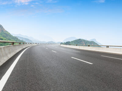 Georgian Authorities Pledge to Build Four-Lane Highway to Borders with Turkey, Armenia, and Azerbaijan by 2030 2 mountain road with blue sky and lush greenery 2026 09 22 09 56 08 utc News